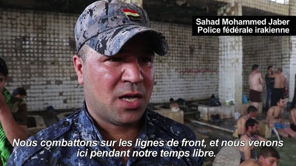Près de Mossoul, soldats et déplacés se retrouvent au spa