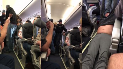 Un passager trainé de force hors d'un avion United