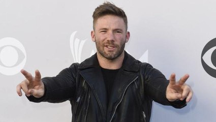 Watch Julian Edelman ride in an IndyCar with Mario Andretti
