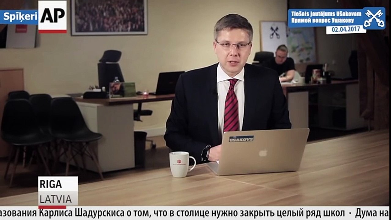 Casual cat totally upstages interview with Latvian mayor