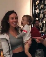 Kendisini Kucağına Alan Kadını Okşayan Küçük Çapkın