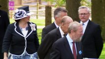 Queen and Duke of Edinburgh feed bananas to elephant on zoo visit