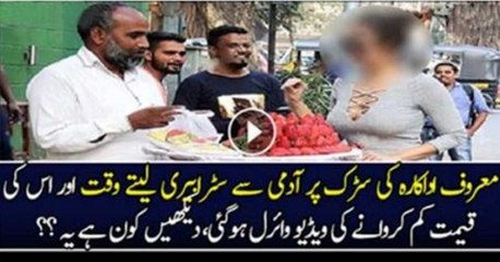 Malika Bargains With Fruit Vendor