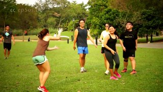 Young Asian People Play Frisbee in Singapore of Asia