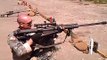 50 cal Barrett sniper rifle fired while kneeling