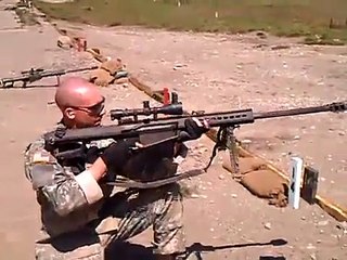 Download Video: 50 cal Barrett sniper rifle fired while kneeling