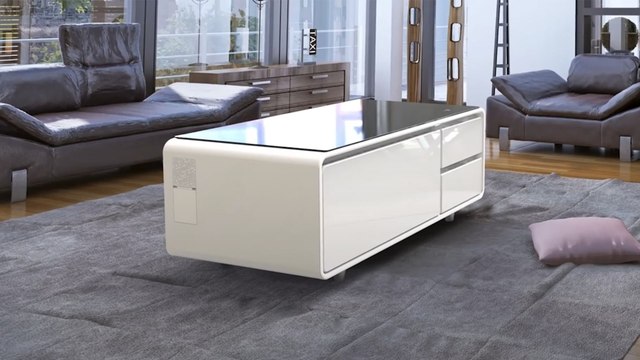 This futuristic coffee table has Bluetooth speakers and a refrigerated drawer
