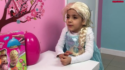 Elsa Vs Rapunzel Chocolate Ice Cream Challenge and Water Fight   Shopkins   Num Noms-EzOkWlm