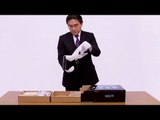 Satoru Iwata (Nintendo) déballe la Wii U avec des gants !