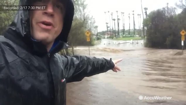 Dangerous floodwaters make road impassable