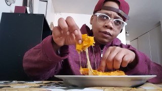 Mukbang come on let's eat..Jamaican style chicken pattie with lots of mozzarella cheese.-tVJ0pir9QVE