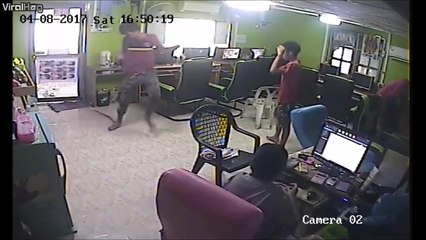 A snake enters in a cafeteria in Thailand and attached on people