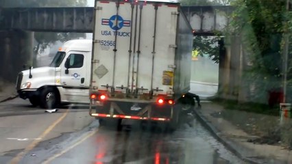 Driver Fails at Low Bridge U-Turn - USA Truck