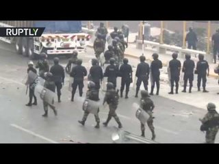 Protesters clash with police, arrests reported as toll booths introduced in Peru