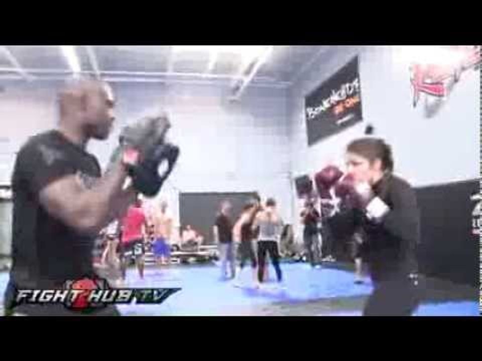 Marina Shafir hits Uriah Hall in the liver; makes him wince in pain while hitting mitts