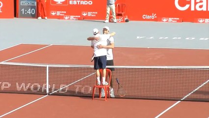 Dudi Sela taking a chair to hug Ivo Karlovic post match