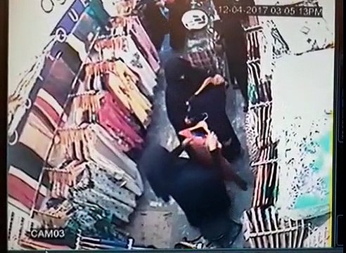 Faisalabad: 2 Hijaab Wearing Ladies stealing Cloths in a shop - CCTV footage