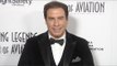 John Travolta arrives at Living Legends of Aviation Awards 2016 Red Carpet