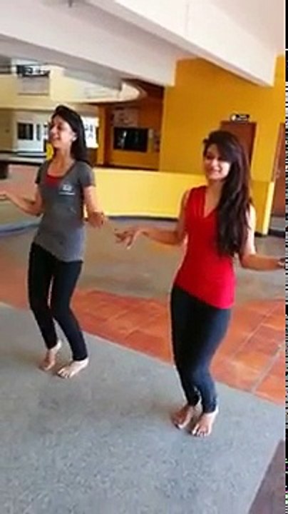 Two Indian Girls dancing to a Bollywood song