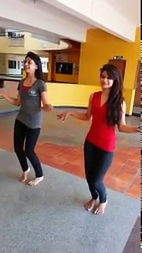 Two Indian Girls dancing to a Bollywood song