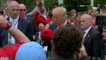 Trump signs hat, throws it back into crowd at Easter Egg Roll