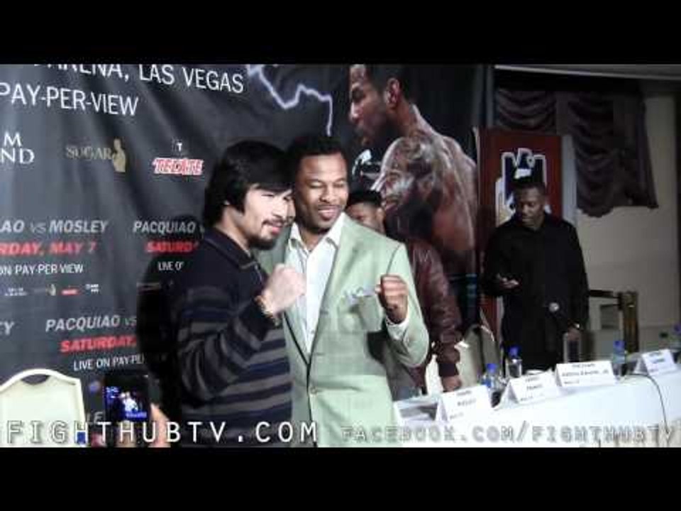 Pacquiao and Mosley Face Off; Pacquaio Sports Beiber Haircut and plays with smart phone