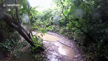 Man flips quad bike on muddy track