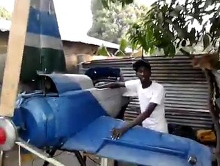 Young Gambia Boy Makes An Helicopter