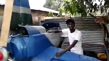 Young Gambia Boy Makes An Helicopter