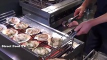 Japanese street food is cooked by the Japanese abalone - delicious seafood lobster