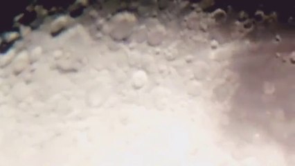 ovni pasando por la Luna grabado desde telescopio