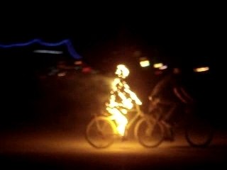 The REAL Burning Man! Man Biking on Fire at BM07