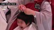 Children get heads shaved by Buddhist monks in South Korea