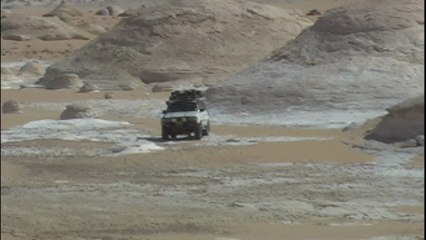 Driving through the White Desert in Egypt.