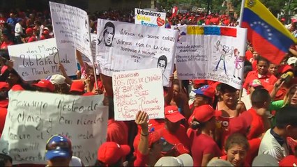 Two killed in mass protests across Venezuela