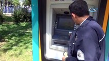 Bankamatikteki düzenek ihbarı polisi alarma geçirdi