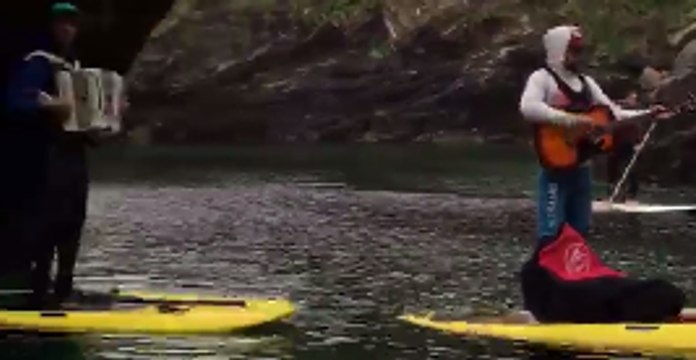 Watch These Musicians Busk on Their Paddleboards and Perform Inside a Cave