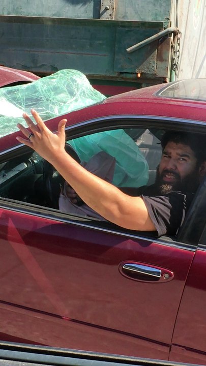 Sedan Dragged By Truck for Miles