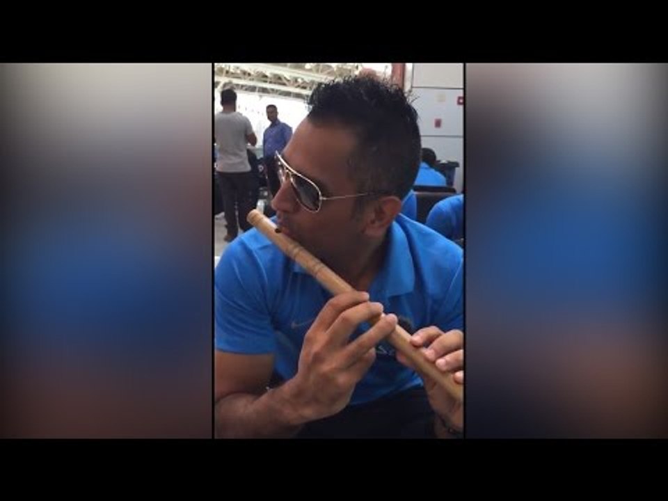 Dhoni playing flute at the airport, Watch the epic moment of 'Captain Cool'| Oneindia News