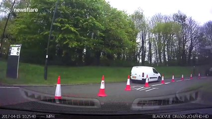 Distracted driver enters service station the wrong way
