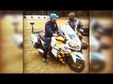 MS Dhoni spotted riding policeman bike in Zimbabwe after match | Oneindia News