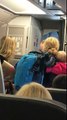 AA Flight attendant violently took a stroller from a lady with her baby