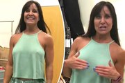 Hot older woman flashes boobs by accident in sexy video