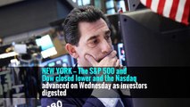NEW YORK — The S&P 500 and Dow closed lower and the Nasdaq advanced on Wednesday as investors digested
