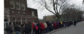 French Voters in Montreal Queue Around the Corner to Cast Ballot