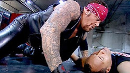 The Undertaker Tombstones The Rock onto a limo- SmackDown