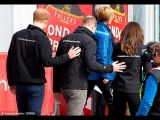 Prince Harry hugs London marathon runners