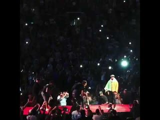 Floyd mayweather walking into presser with Irish flag
