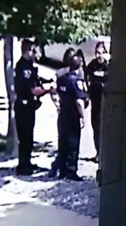 Cop chokes perp after he spits on him
