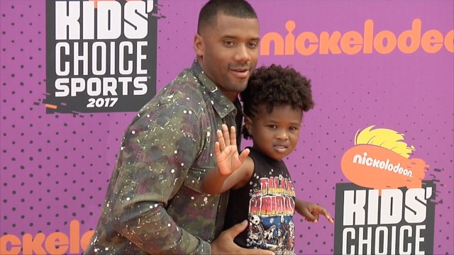 Russell Wilson with Future Jr 2017 Kids’ Choice Sports Awards Orange Carpet